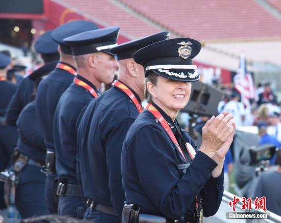 资料图:美国警方人士。 中新社记者 张朔 摄